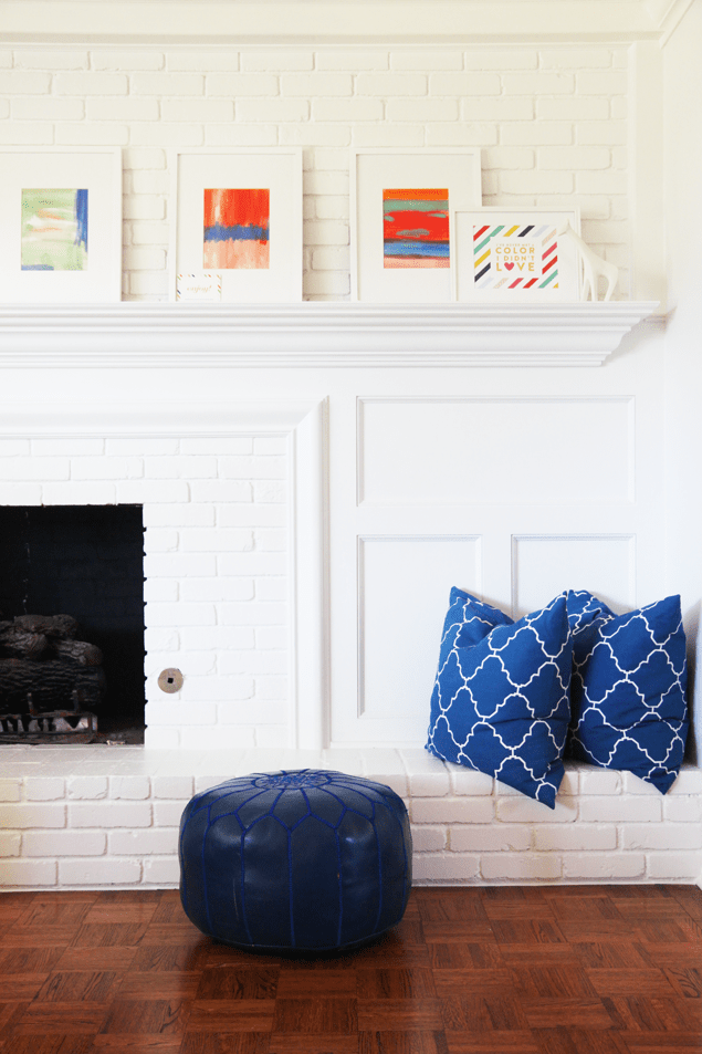All white mantel with colorful accents