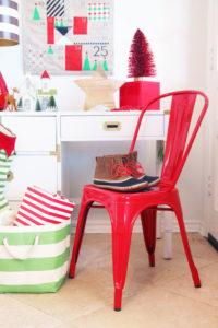 Shiny & bright red Tolix chair in our preppy kitchen, decorated for Christmas - www.pencilshavingsstudio.com
