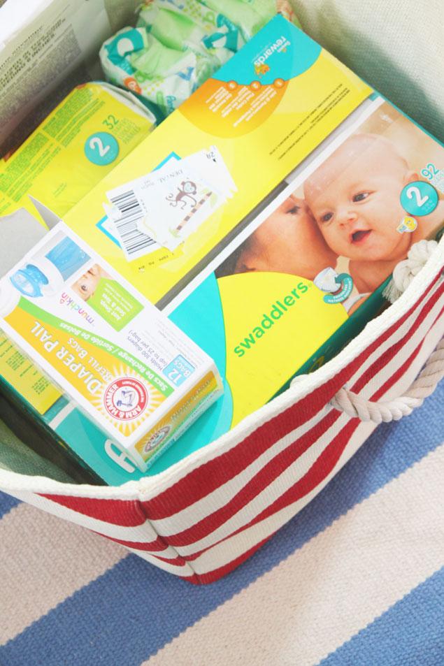 stripe tote holding diapers