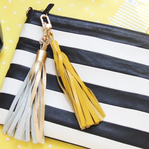 Leather black and white striped bag with yellow and gold leather tassels by xo Monica Lee at Pencil Shavings Studio www.pencilshavingsstudio.com