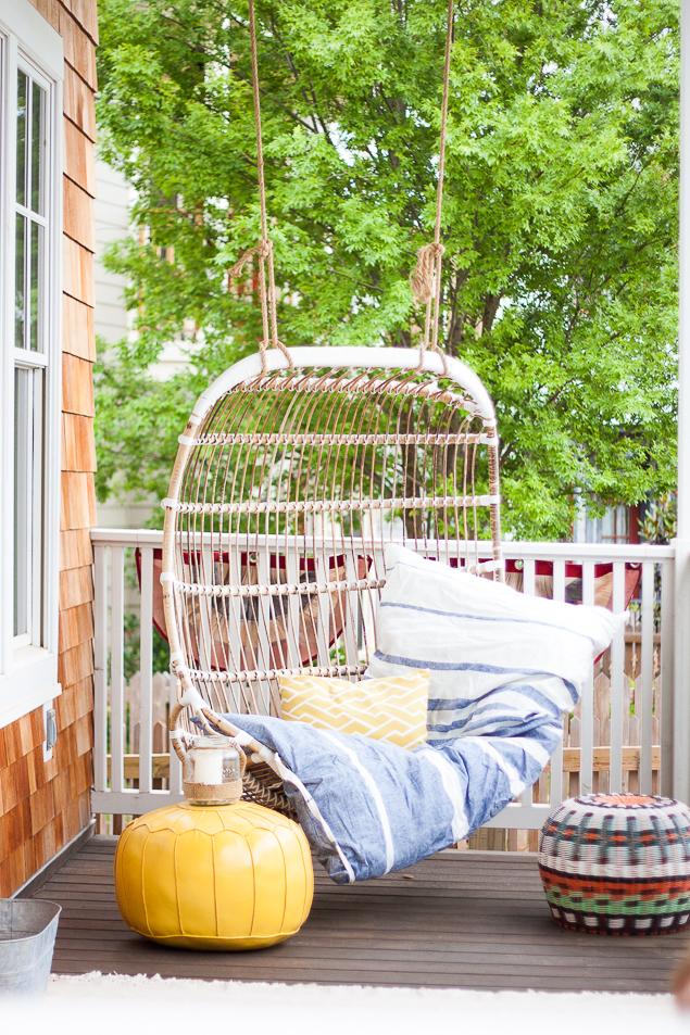 Serena & Lily hanging rattan chair - Hedgehouse throwbed - front porch ideas - southern porch - porch swing - www.pencilshavingsstudio.com
