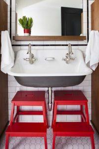 Kohler brockway sink in bathroom with red stools - www.pencilshavingsstudio.com