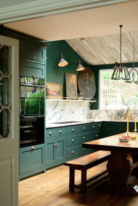 hunter green kitchen cabinets with marble and natural wood accents www.pencilshavingsstudio.com
