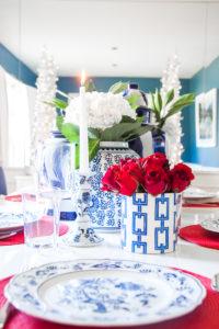 Christmas home tour with Pencil Shavings Studio; Chinoiserie-inspired Christmas decor with blue and white ginger jars, red accents, and loads of boxwood. www.pencilshavingsstudio.com