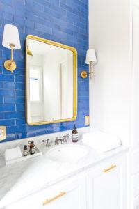 Lake house master bathroom reveal - handmade blue tile - Mercury Mosaic tile - Visual Comfort lighting - bathroom vanity - blue subway tile - cobalt subway tile - white cabinets - colorful master bathroom - hex tile floor - patterned hexagon floor tiles - www.pencilshavingsstudio.com